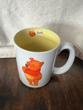 Disney Winnie the Pooh White Mug with Yellow Interior and Orange Graphic